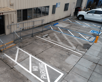 Completed ADA Project With Door Closer, Ramp, Parking & Signage